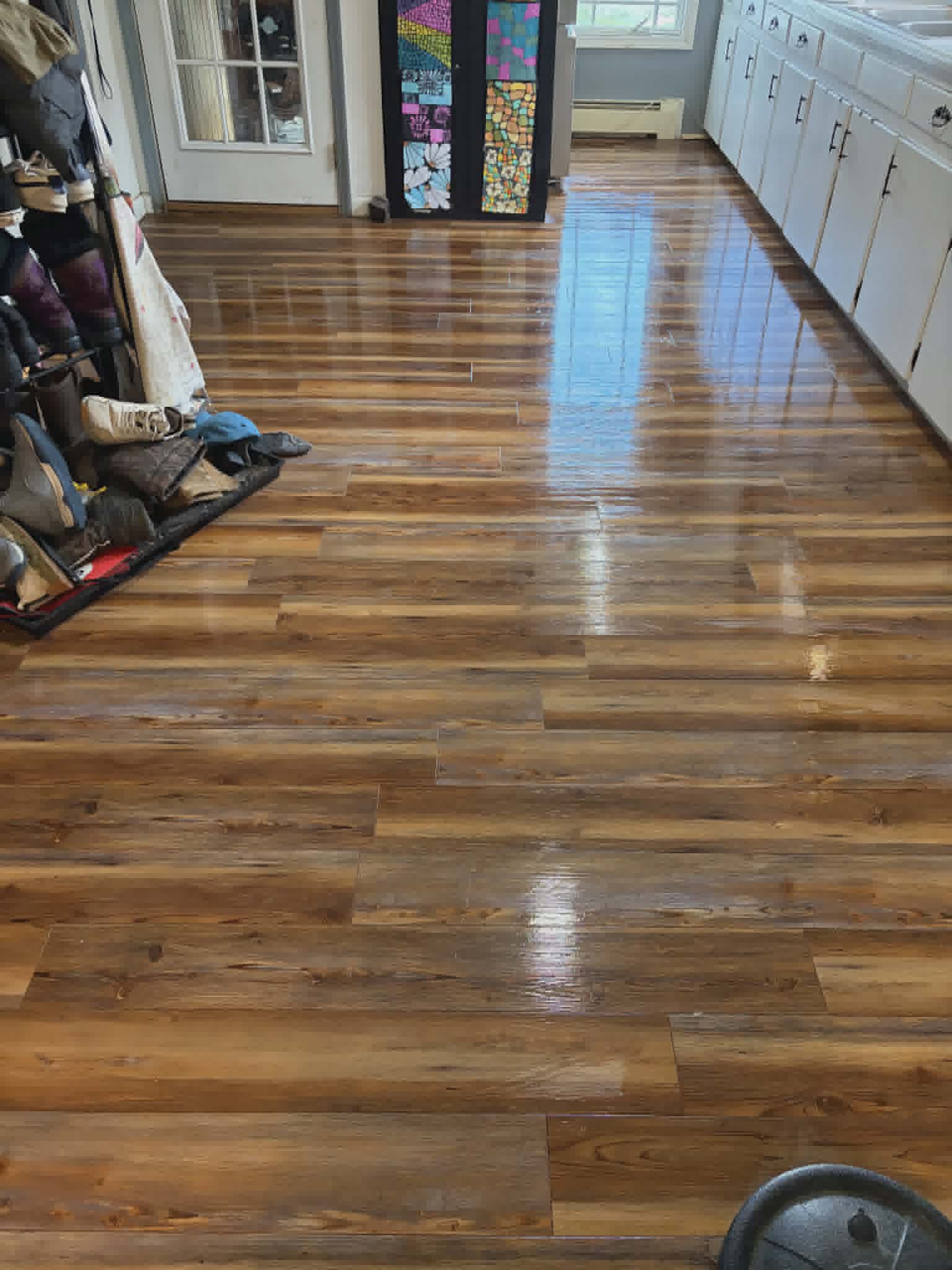 Hardwood floor after cleaning — deep glossy shine