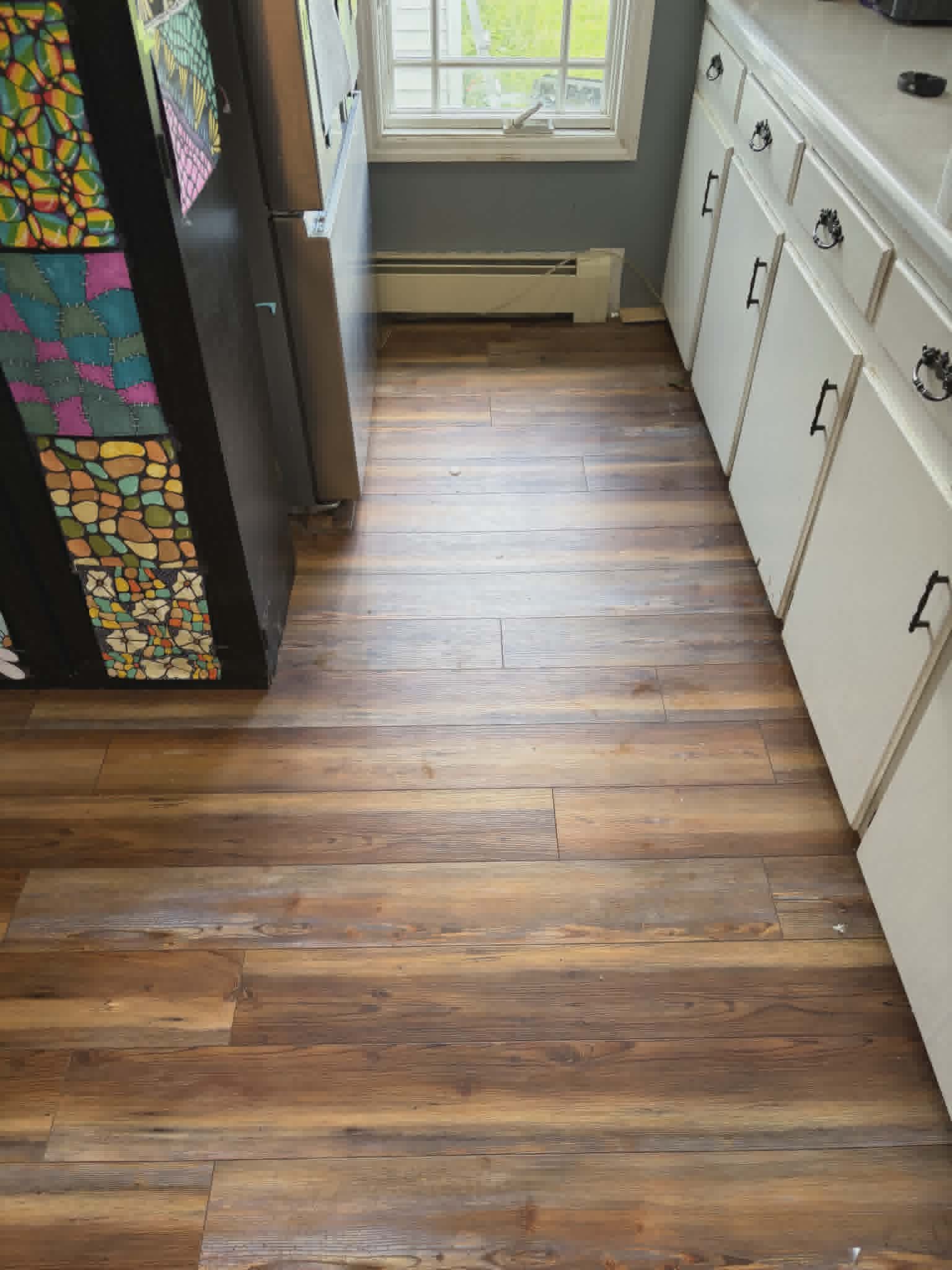 Hardwood floor before cleaning — dull and hazy