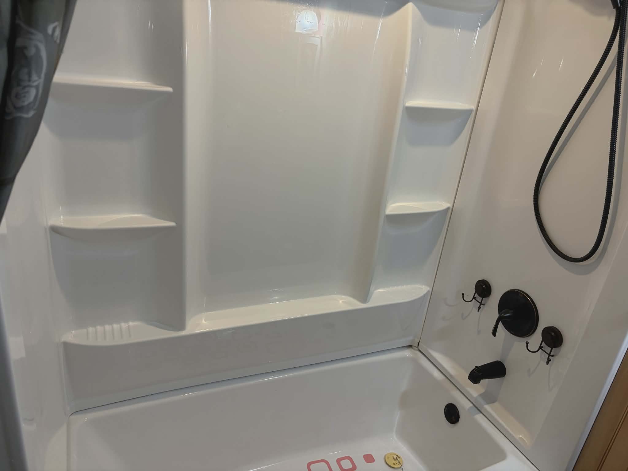 Tub and shower after cleaning — spotless